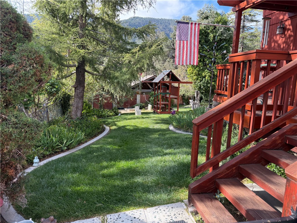 921 Piru Way Frazier Park, CA 93225 - Photo 41 of 62 a view of a house with backyard