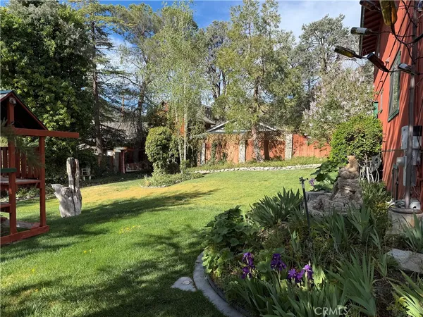 an aerial view of a house with a mountain view