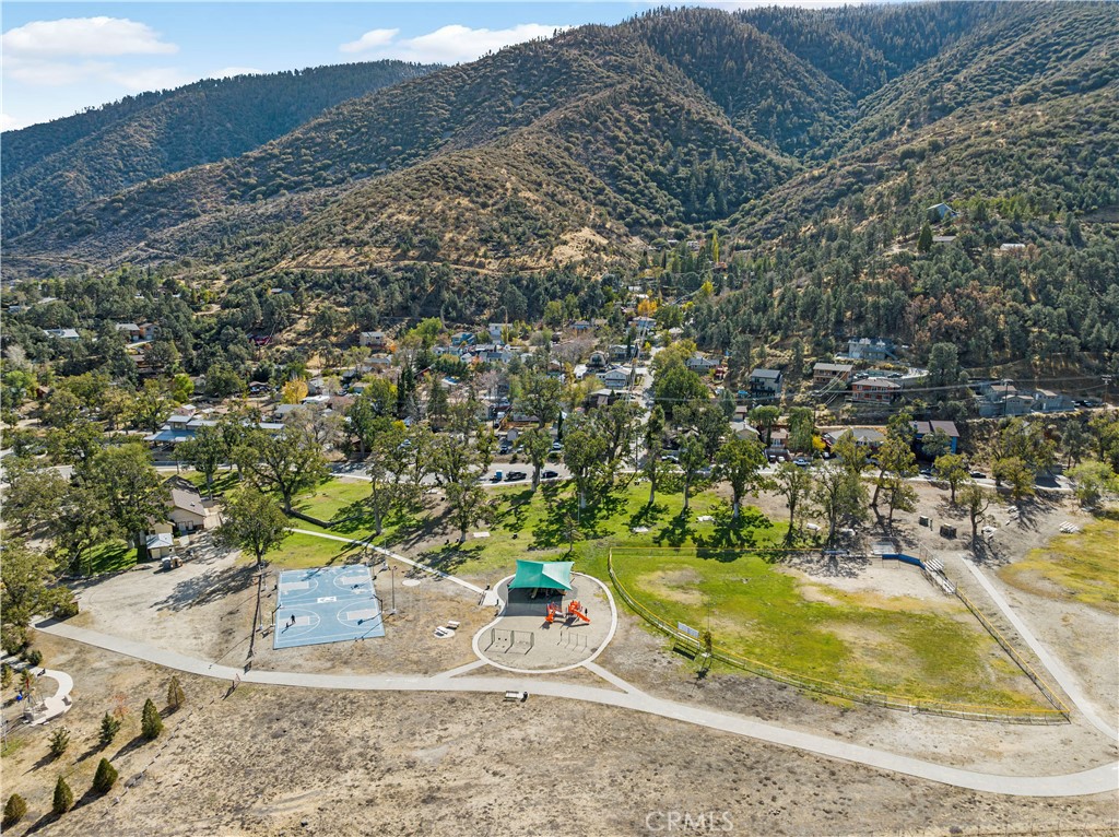 921 Piru Way Frazier Park, CA 93225 - Photo 56 of 62 a view of a swimming pool with a yard