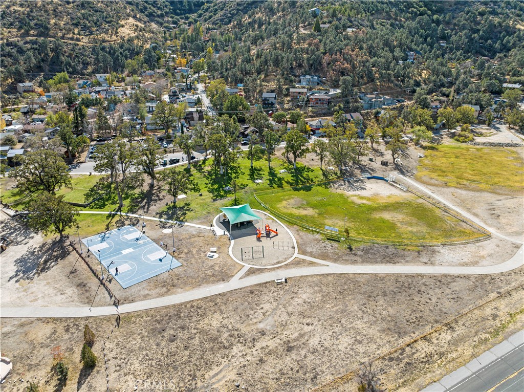 921 Piru Way Frazier Park, CA 93225 - Photo 57 of 62 a view of a swimming pool with an outdoor space