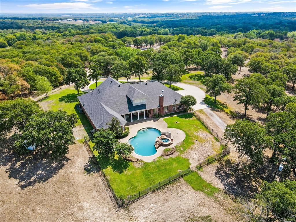 2080 County Road 2445 Decatur, TX 76234 - Photo 21 of 40 an aerial view of a house with a yard