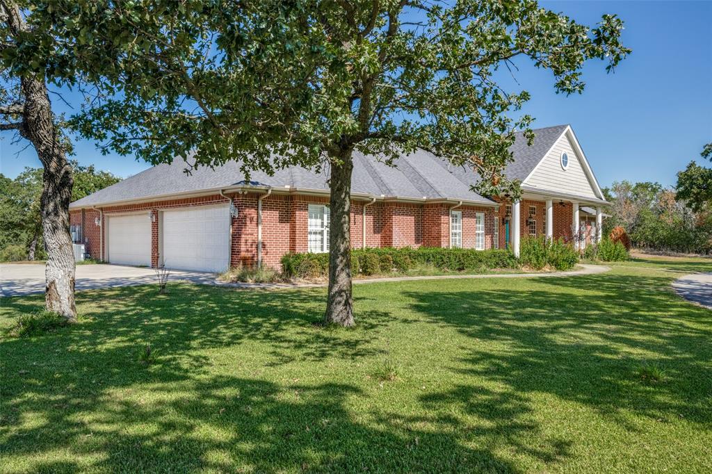 2080 County Road 2445 Decatur, TX 76234 - Photo 28 of 40 a house view with a garden space