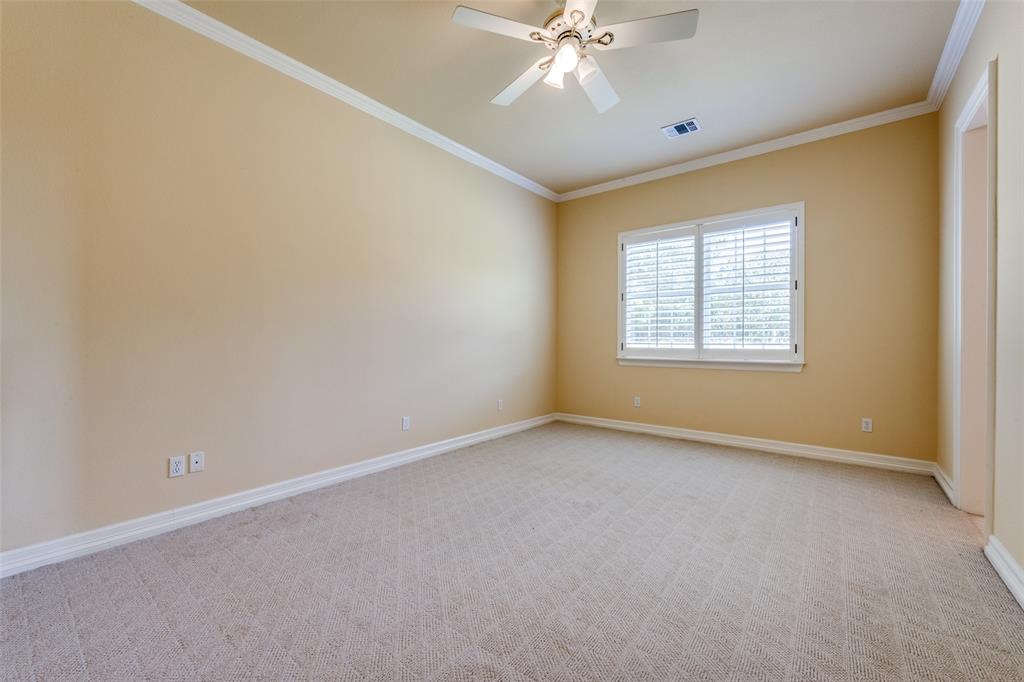 2080 County Road 2445 Decatur, TX 76234 - Photo 33 of 40 an empty room with windows and fan