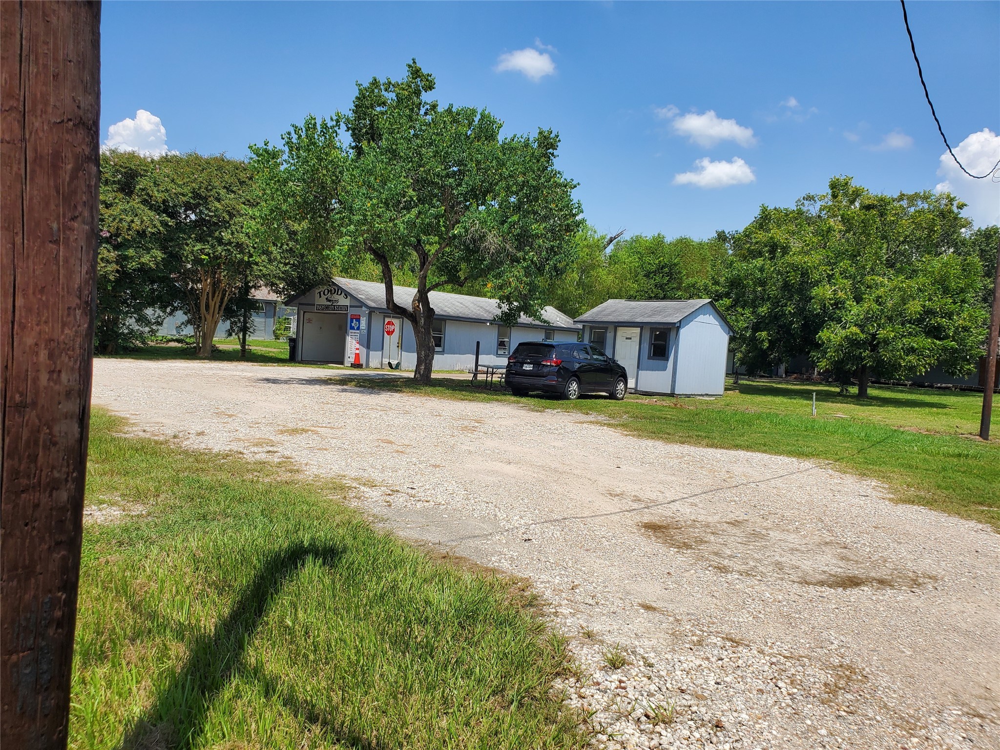 1635 West Cedar Bayou Lynchburg Road Baytown, TX 77521 - Photo 11 of 16 a view of house with outdoor space and swimming pool