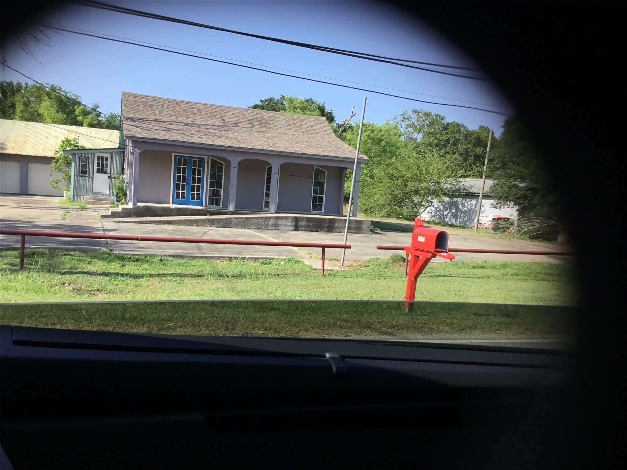 1635 West Cedar Bayou Lynchburg Road Baytown, TX 77521 - Photo 7 of 16 a front view of a house with a yard