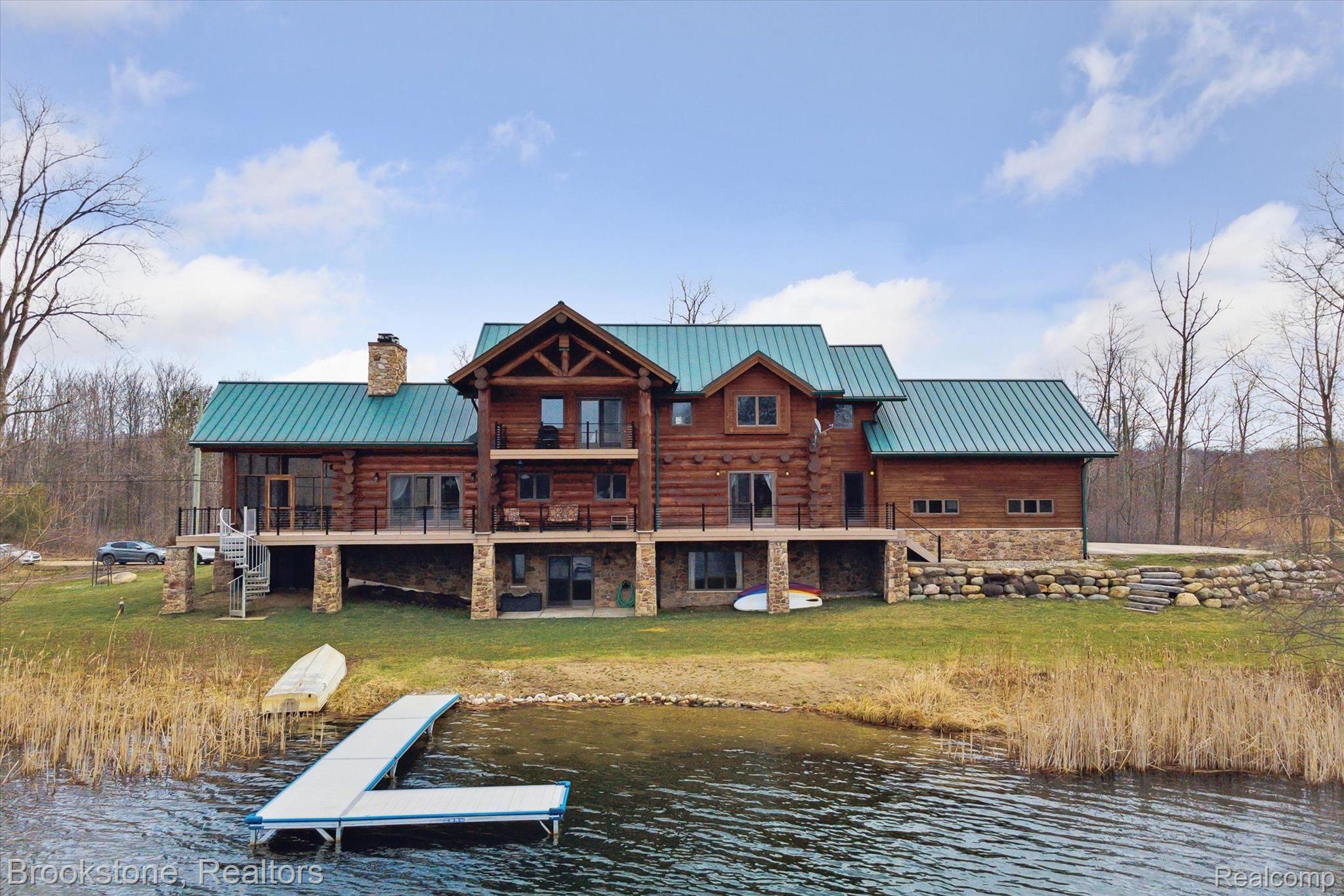 8695 Ellis Road Clarkston, MI 48348 - Photo 57 of 69 Striking lakefront log cabin with walkout basement
