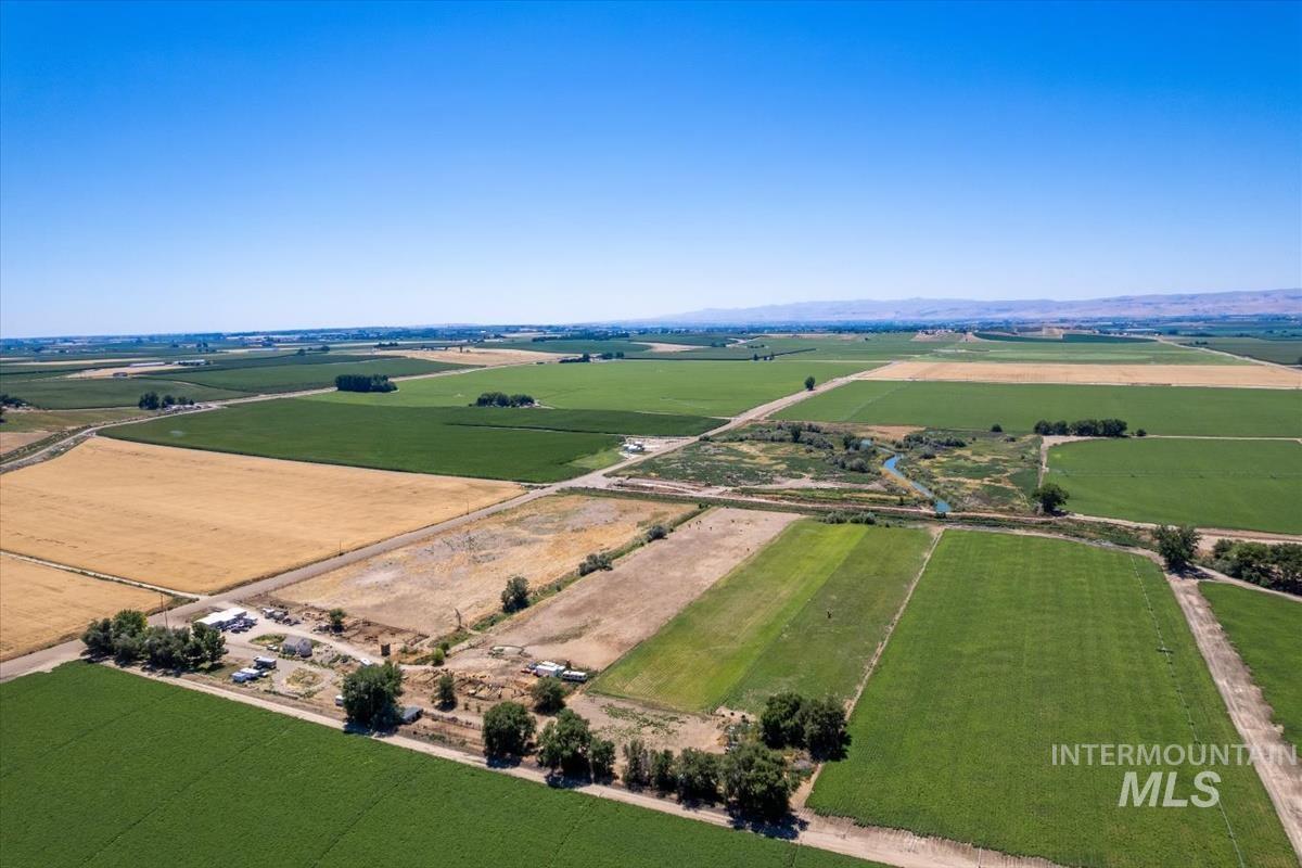 23743 Stephen Lane Parma, ID 83660 - Photo 8 of 34 Overview of rural landscape featuring rows of crops