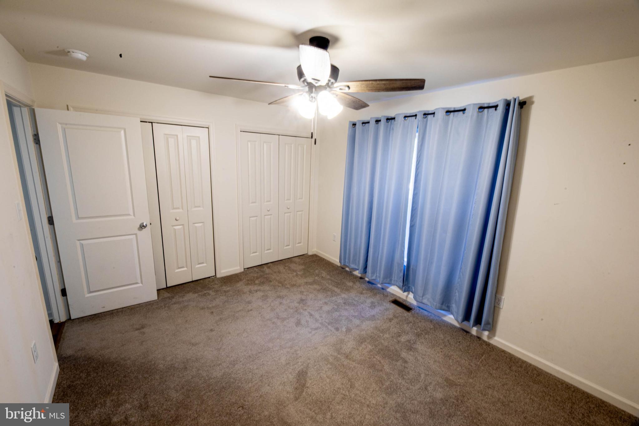 26300 Fire Tower Road Seaford, DE 19973 - Photo 35 of 52 a view of an empty room and a ceiling fan