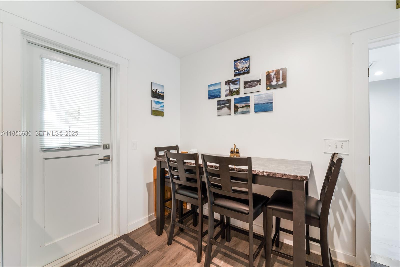 512 Northwest 13th Street Homestead, FL 33030 - Photo 13 of 39 a view of a dining room with furniture and window