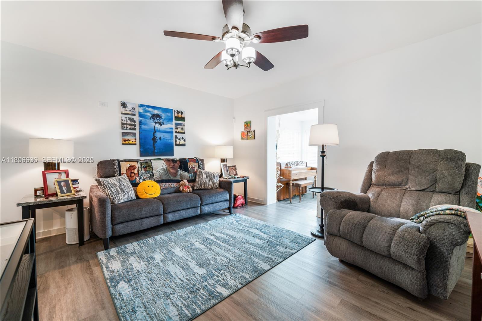 512 Northwest 13th Street Homestead, FL 33030 - Photo 8 of 39 a living room with furniture and a couch