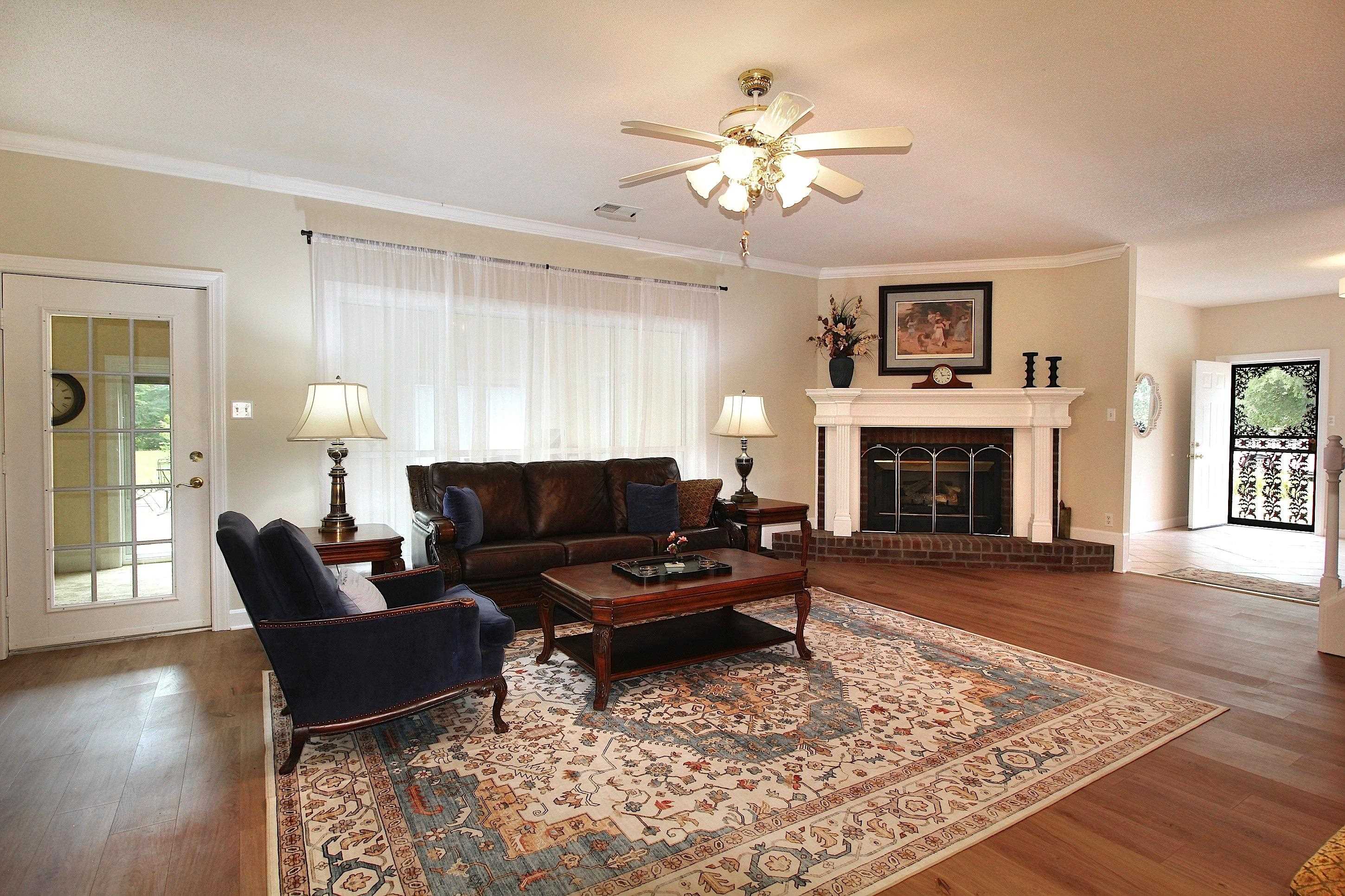 2550 North Reid Hooker Road Eads, TN 38028 - Photo 10 of 32 a living room with furniture and a fireplace