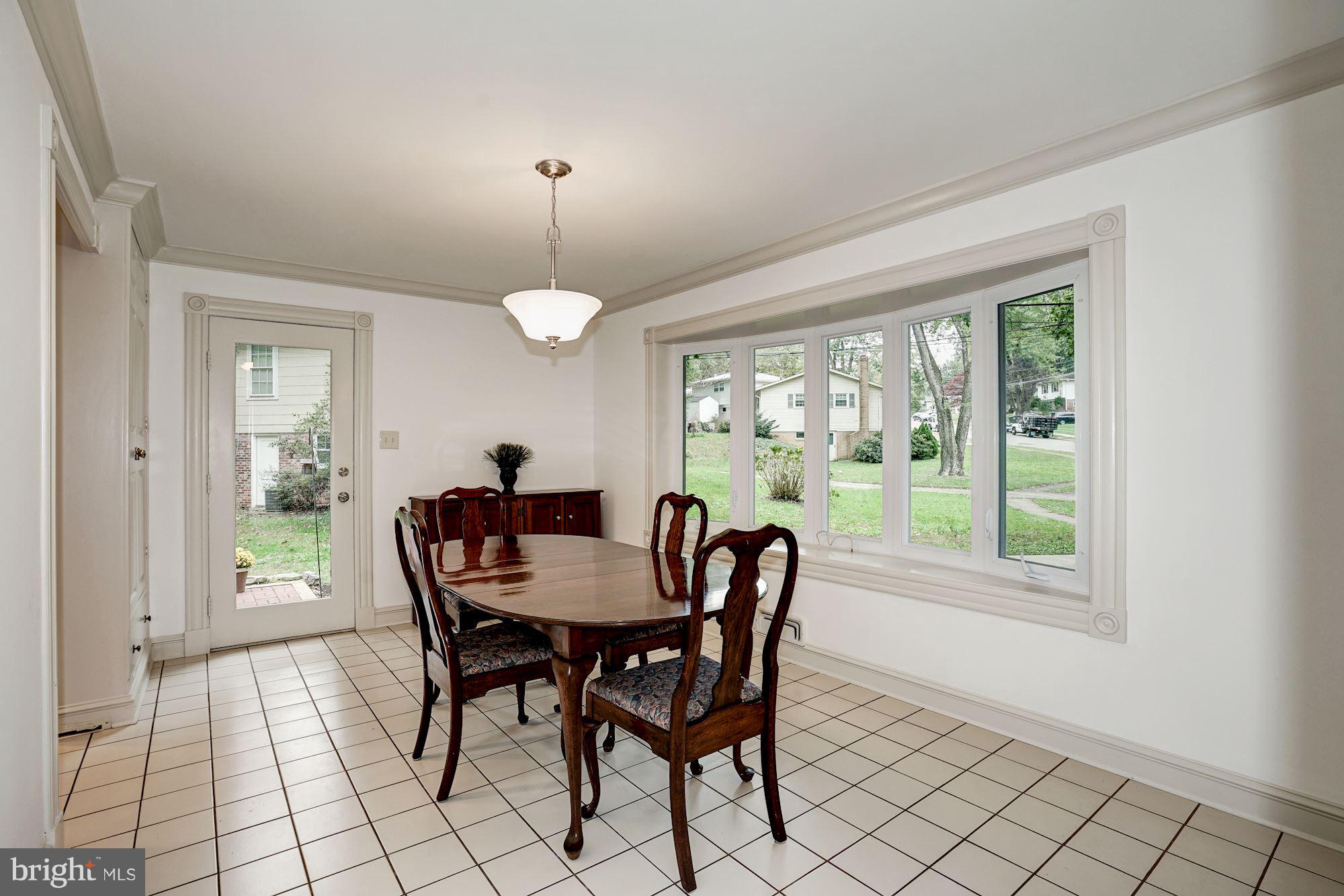 6201 Tyner Street Springfield, VA 22152 - Photo 7 of 30 Dining Room: Glass door to side Patio