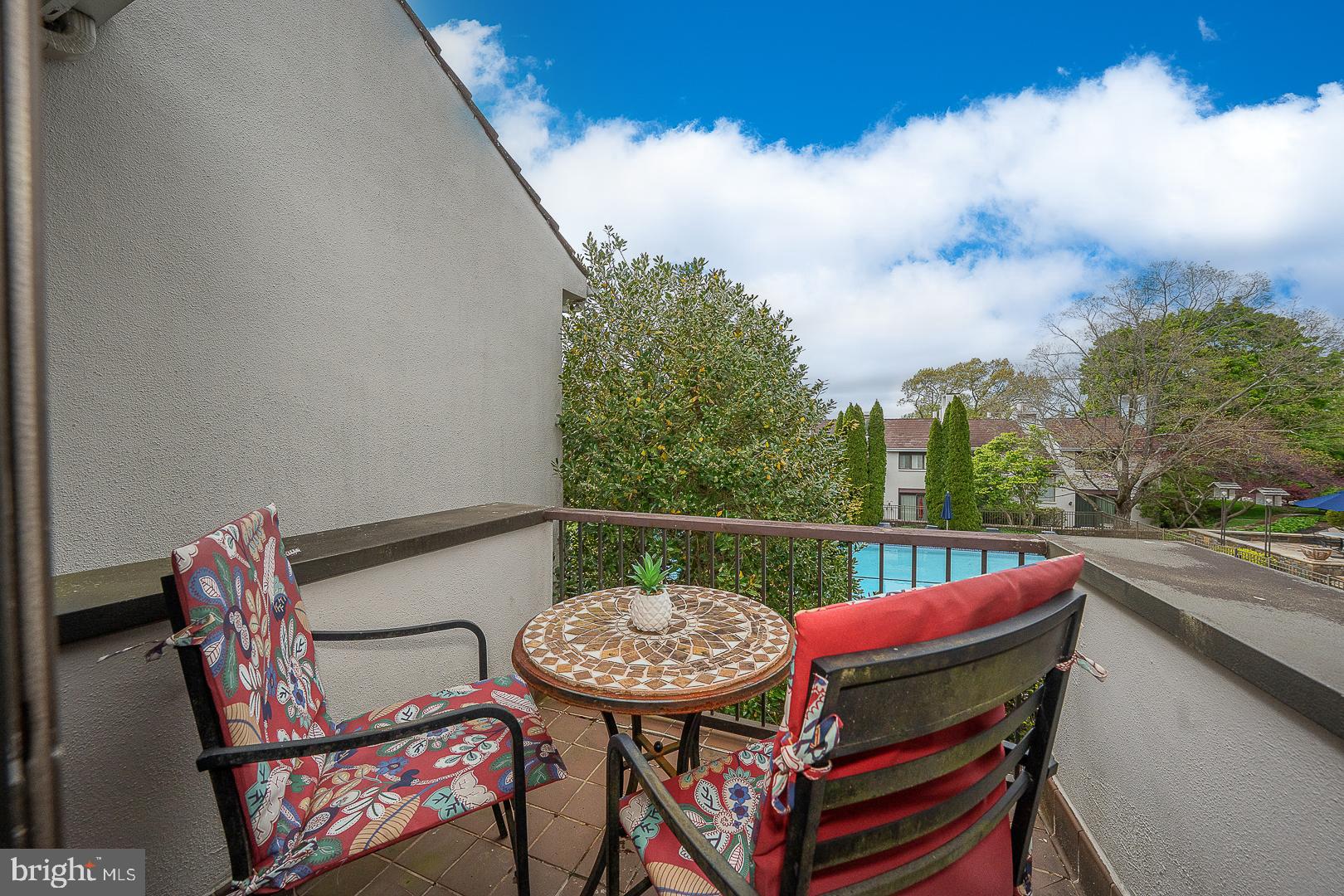 7 Brettagne, Unit 7 Devon, PA 19333 - Photo 32 of 48 Balcony located off 3rd bedroom with pool views