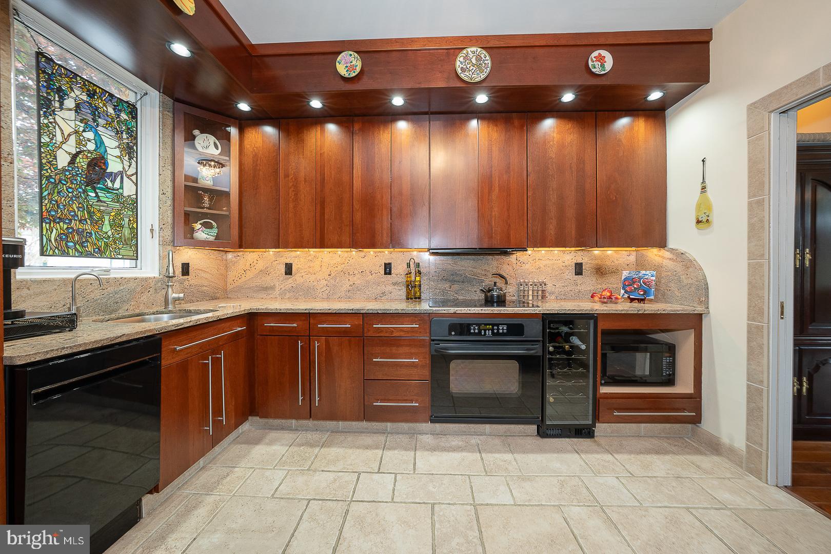 7 Brettagne, Unit 7 Devon, PA 19333 - Photo 5 of 48 upgraded kitchen with a wine cooler