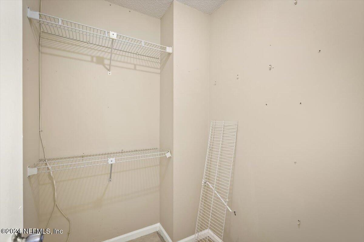 2432 Wattle Tree Road East Jacksonville, FL 32246 - Photo 25 of 25 a bathroom with a shower