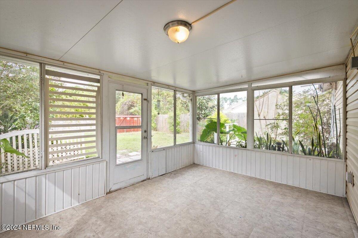 2432 Wattle Tree Road East Jacksonville, FL 32246 - Photo 5 of 25 a view of an empty room with a window