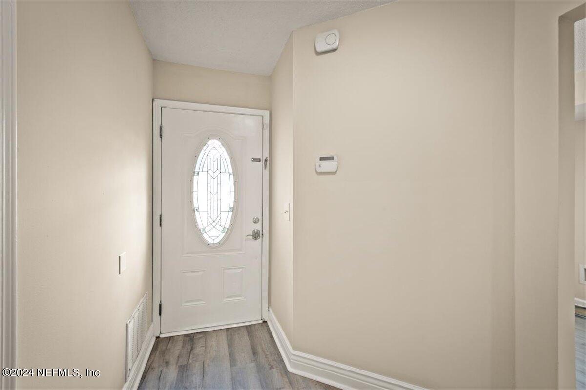 2432 Wattle Tree Road East Jacksonville, FL 32246 - Photo 7 of 25 a view of bathroom with wooden floor