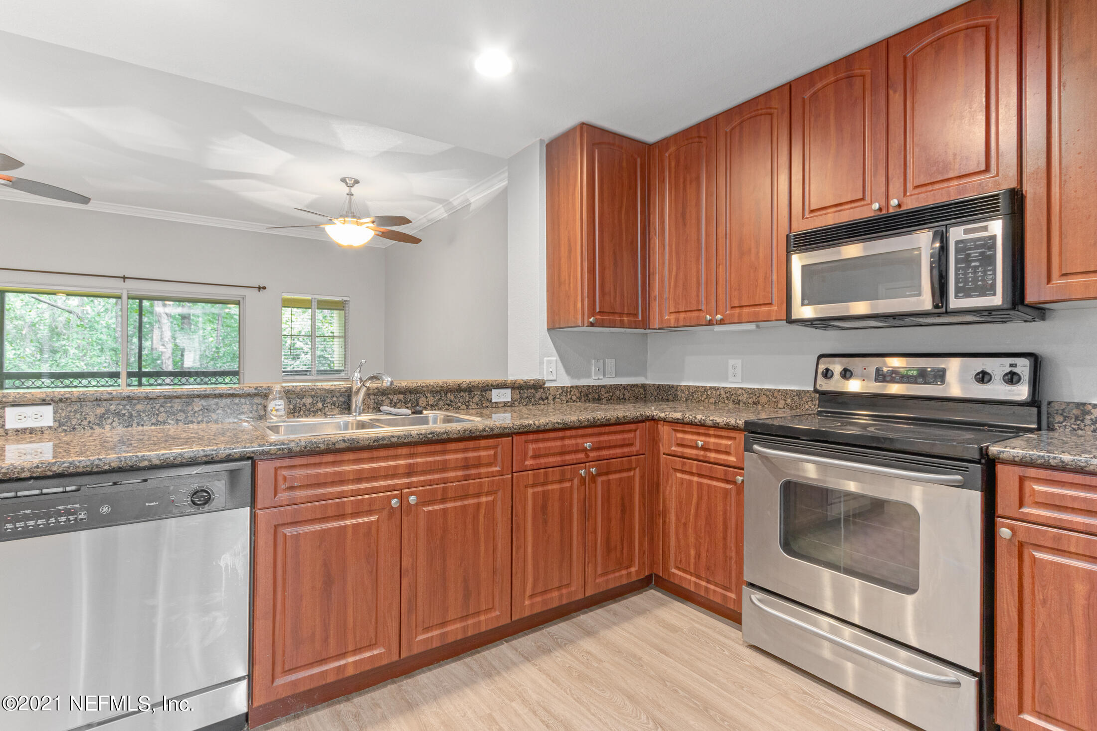 9745 Touchton Road, Unit 2223 Jacksonville, FL 32246 - Photo 6 of 28 Kitchen to Living Room