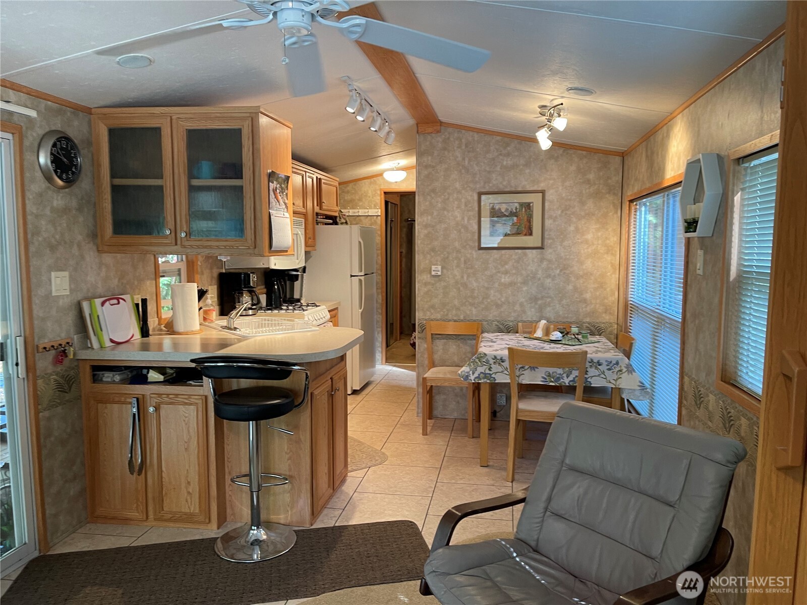 53 Branch Circle Maple Falls, WA 98266 - Photo 12 of 39 a kitchen with stainless steel appliances granite countertop a sink and a refrigerator