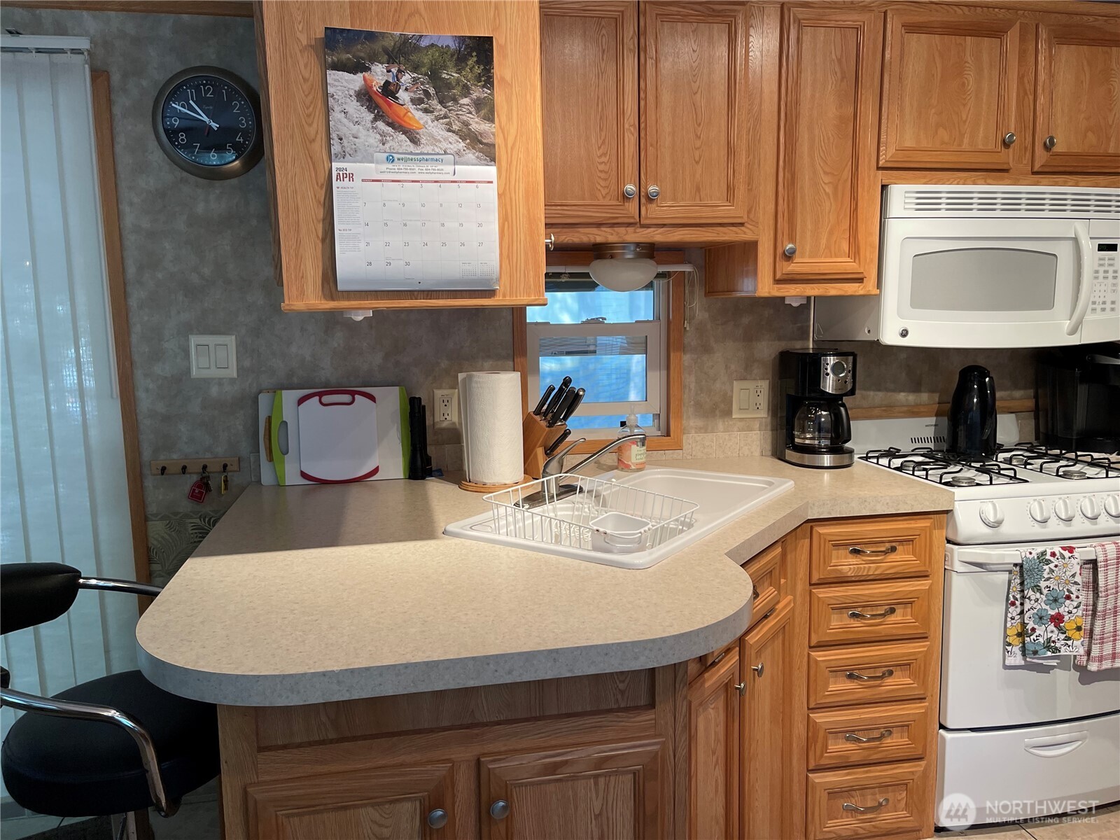 53 Branch Circle Maple Falls, WA 98266 - Photo 14 of 39 a kitchen with a appliances a sink and cabinets