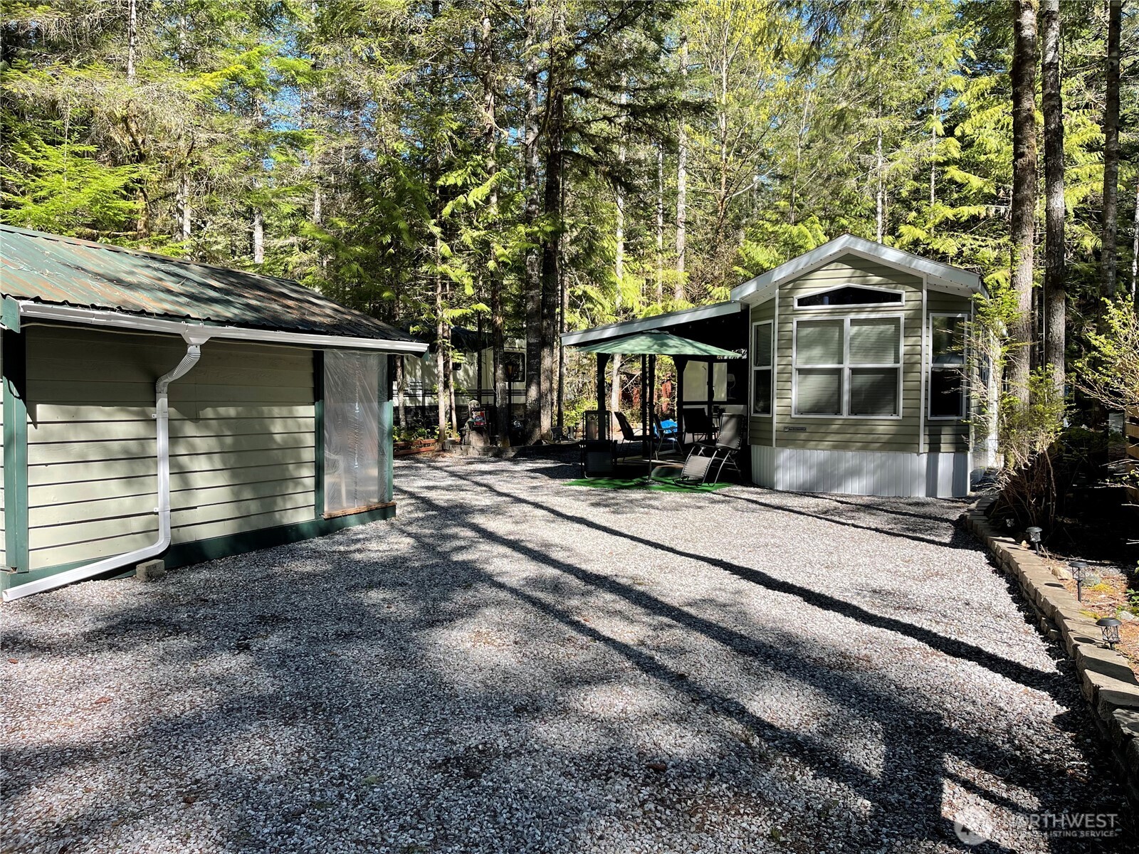 53 Branch Circle Maple Falls, WA 98266 - Photo 2 of 39 a front view of a house with a yard