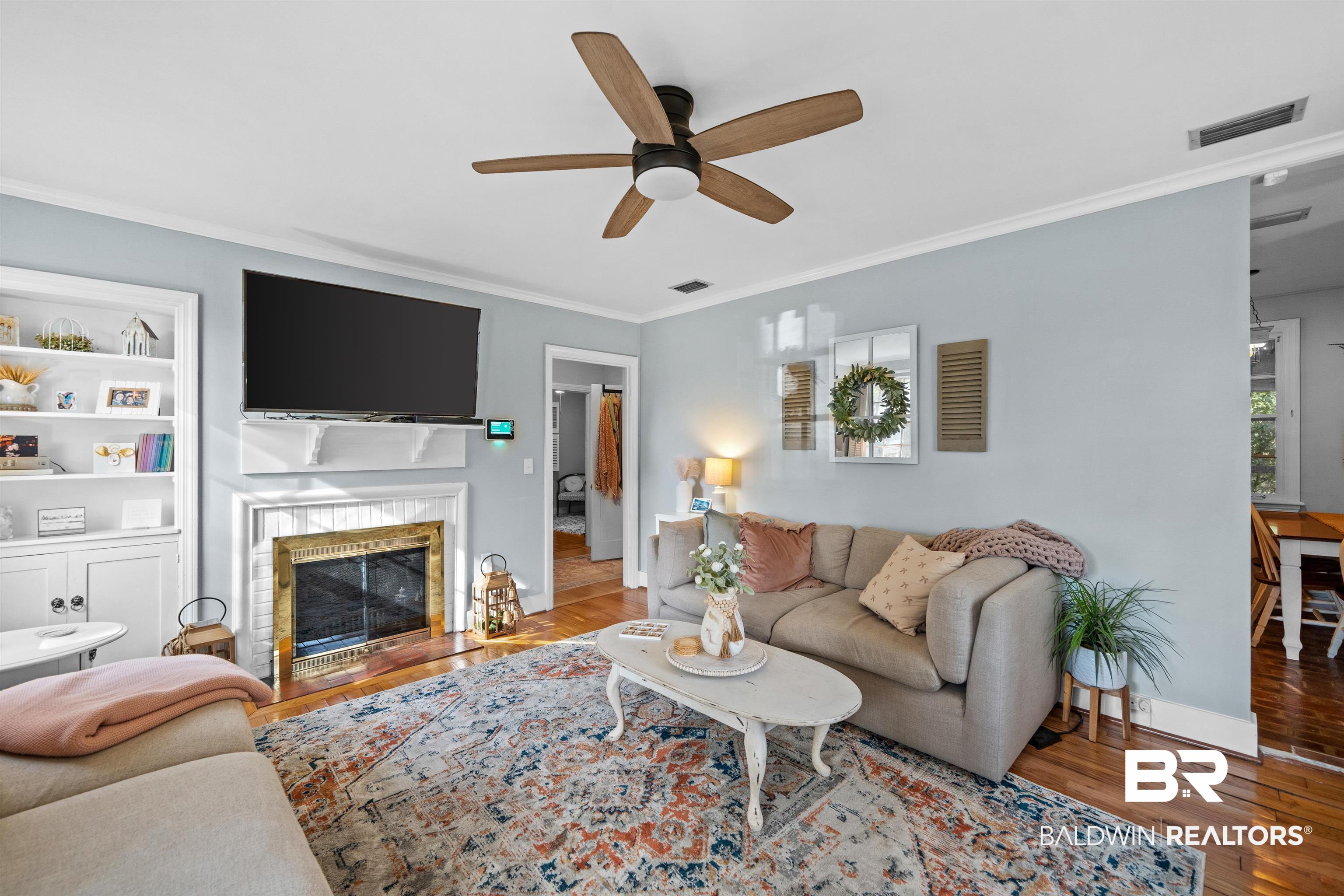 5128 Norton Lane Mobile, AL 36608 - Photo 5 of 32 Living Room with wood-burning Fireplace