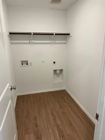 a view of small space with racks on the wall