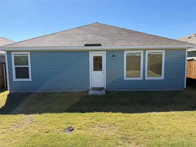 a view of a house with swimming pool