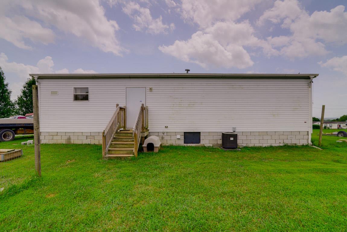 78 Tomlinson Road Lebanon, TN 37087 - Photo 3 of 13 a view of a house with a backyard