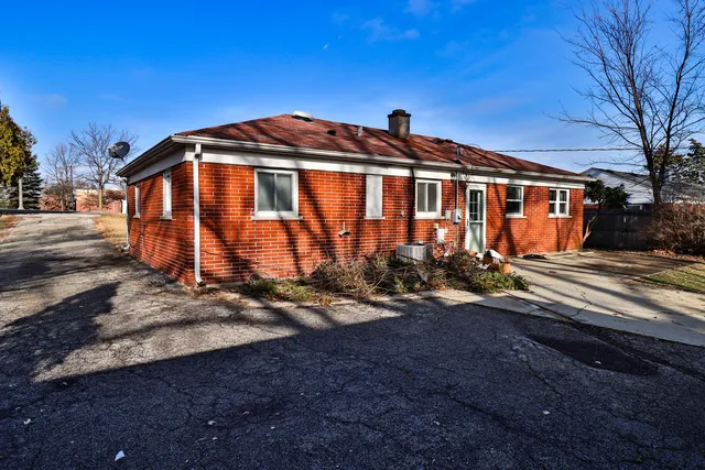 a front view of a house with yard