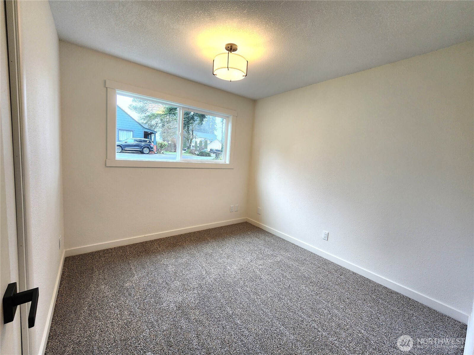 103 Kraft Road Longview, WA 98632 - Photo 14 of 19 an empty room with a window