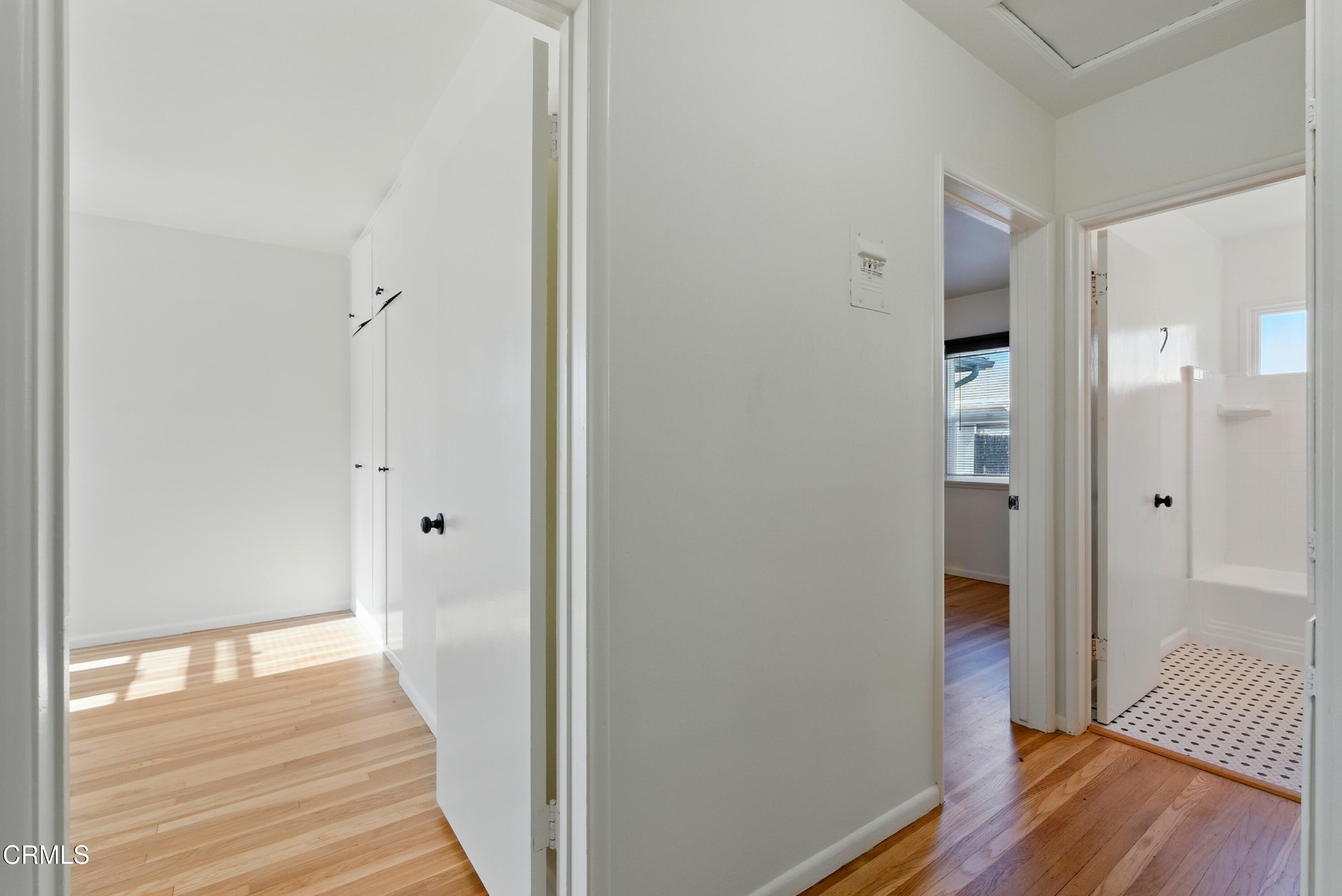 1545 Riverside Drive Glendale, CA 91201 - Photo 12 of 19 a view of a hallway with wooden floor