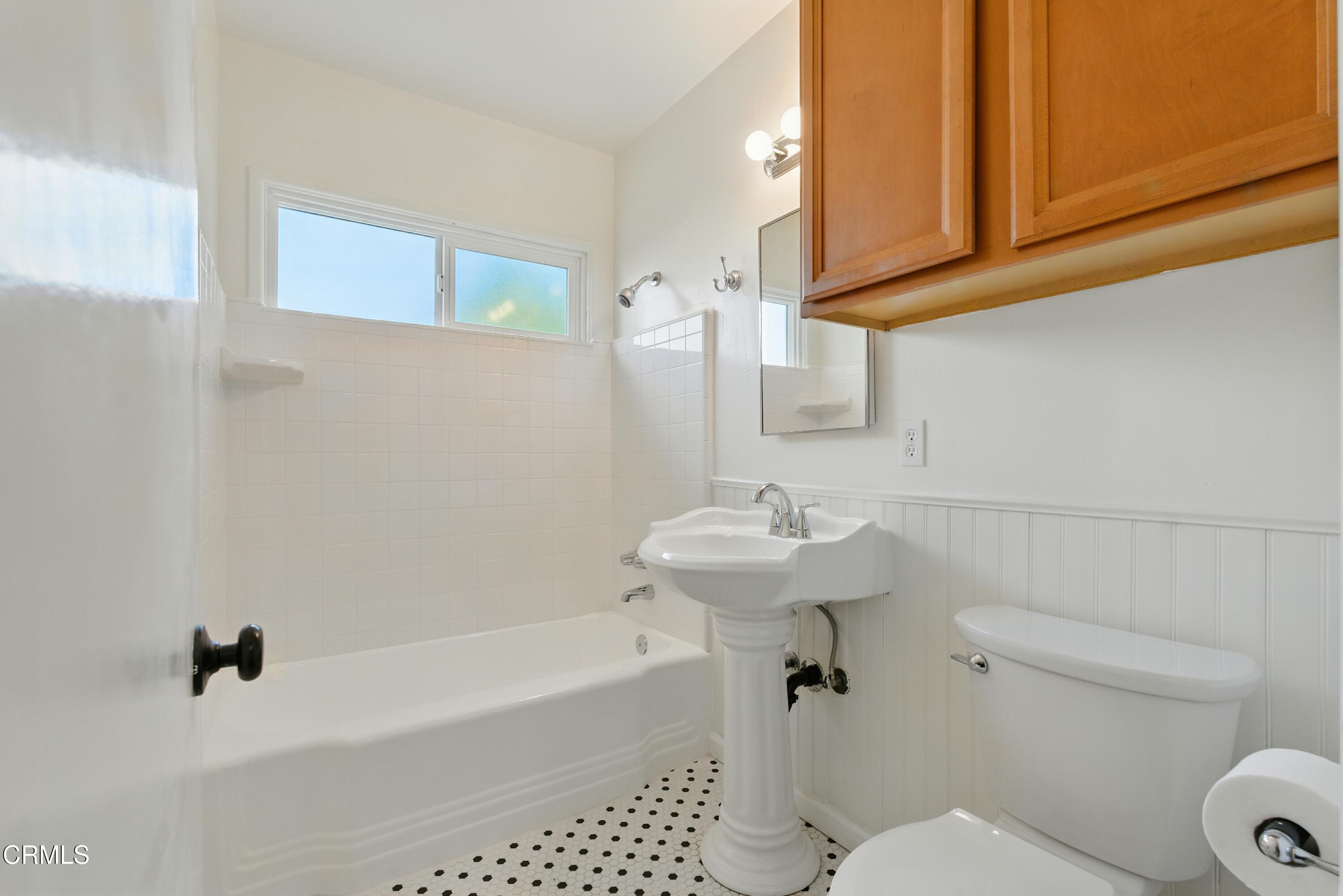1545 Riverside Drive Glendale, CA 91201 - Photo 16 of 19 a bathroom with a sink a toilet and bathtub
