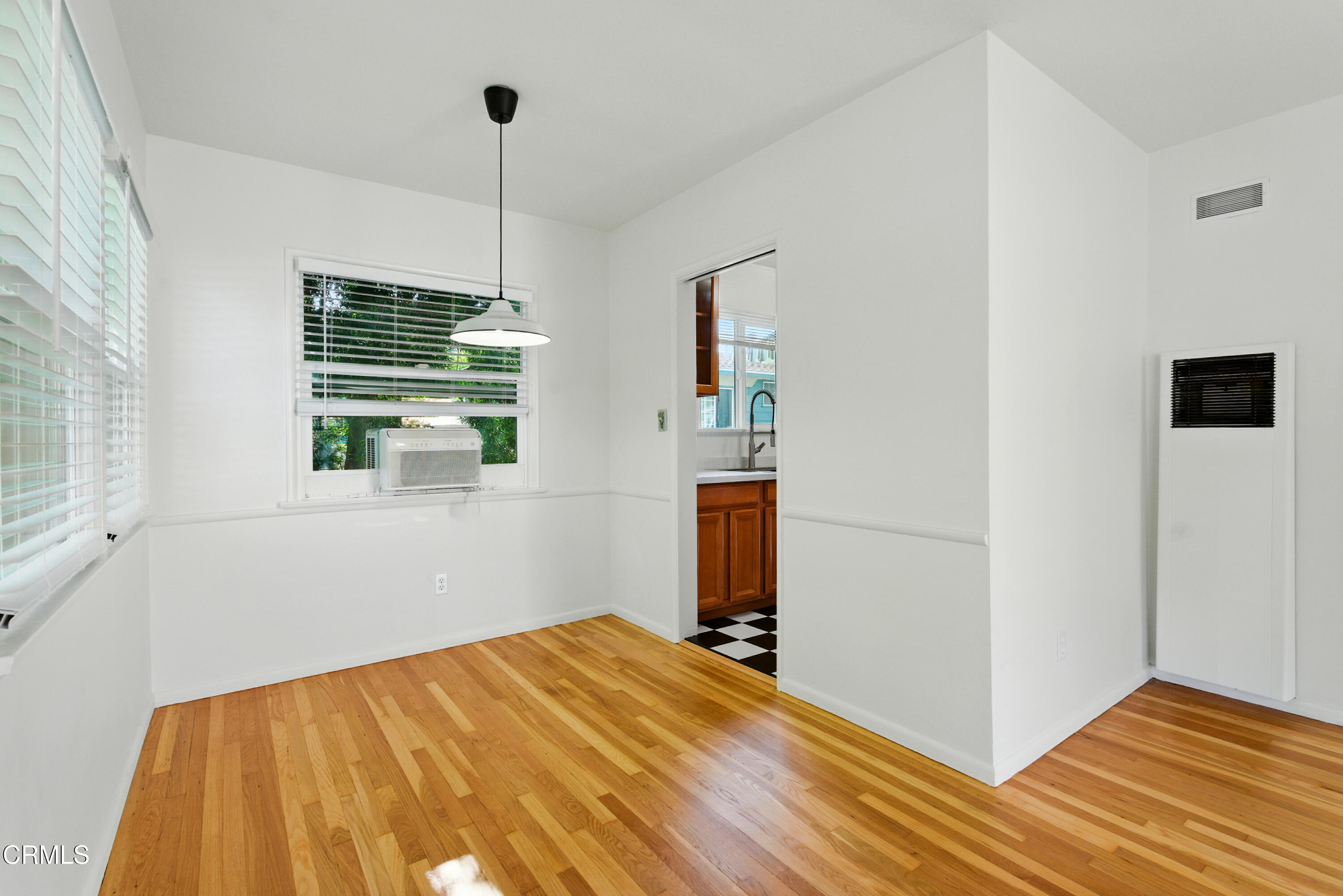 1545 Riverside Drive Glendale, CA 91201 - Photo 3 of 19 a bedroom with a bed and a window