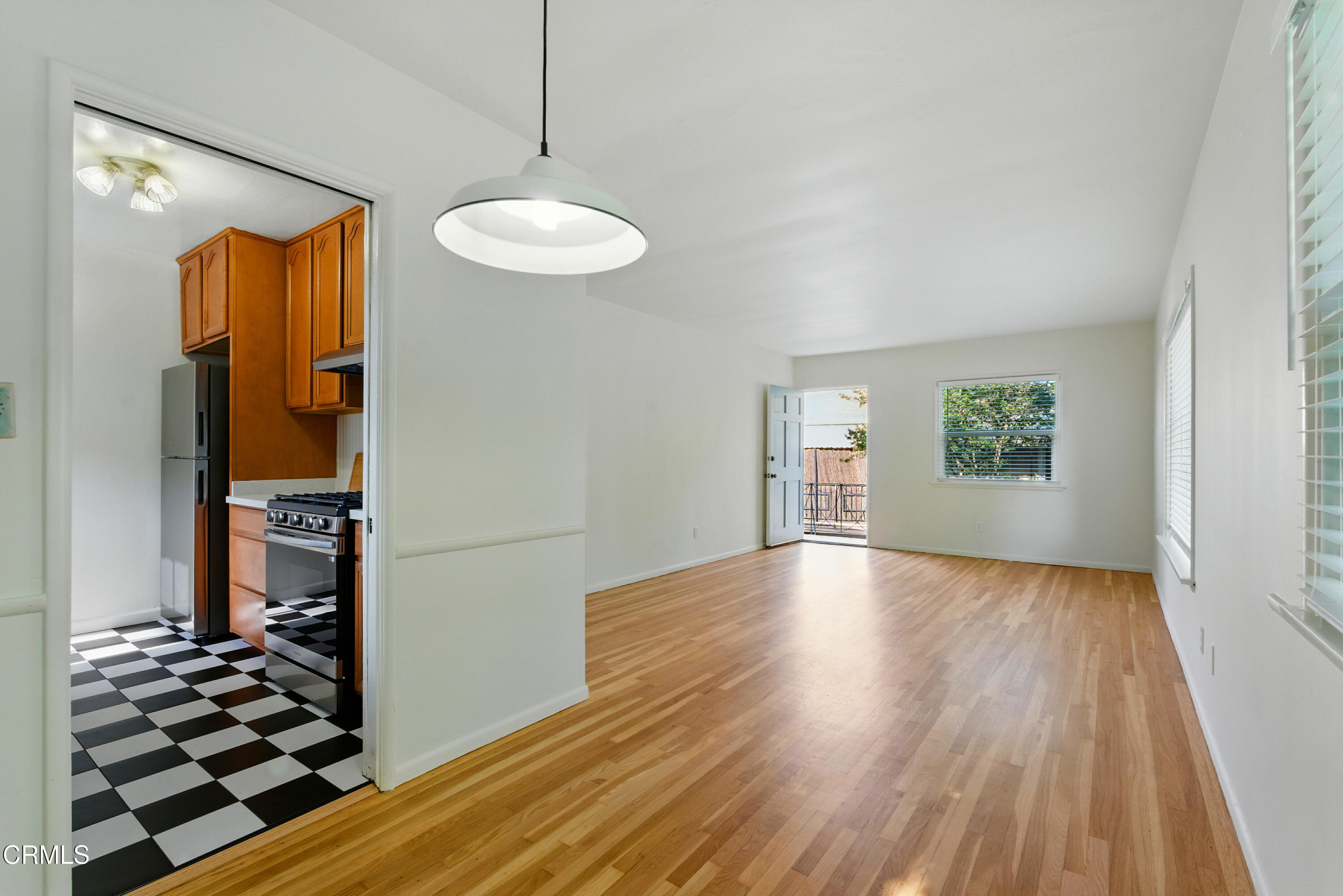 1545 Riverside Drive Glendale, CA 91201 - Photo 10 of 19 wooden floor in an empty room with a window