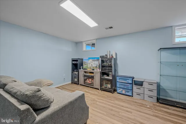 a bedroom with furniture and closet