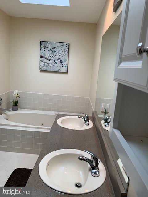 1775 Talbot Road Blue Bell, PA 19422 - Photo 14 of 22 MB has skylight double sink, tub and stall shower