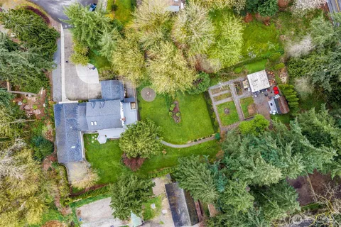 a backyard of a building with a tree