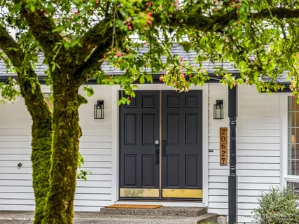 a house view with a backyard space
