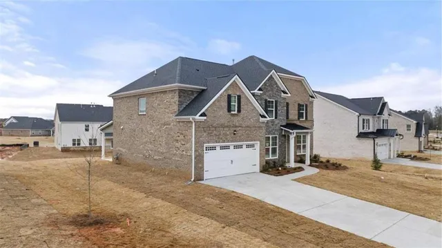 a view of a house with a street