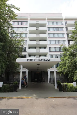 a view of a building with a porch