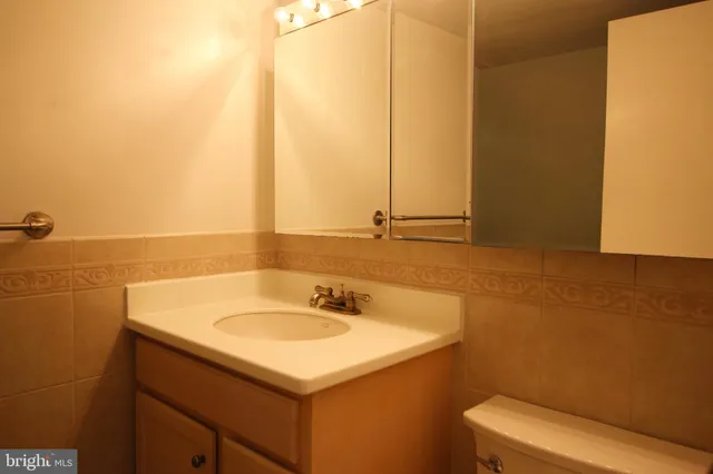 a bathroom with a sink and a toilet