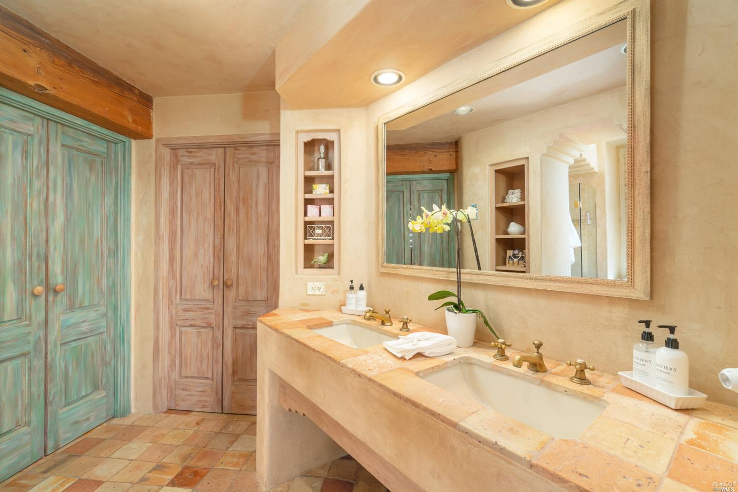 245 Water Street Richmond, CA 94801 - Photo 26 of 45 a bathroom with a granite countertop sink mirror and double