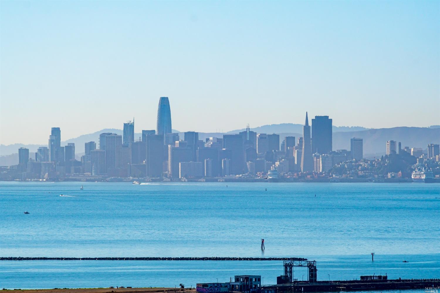 245 Water Street Richmond, CA 94801 - Photo 39 of 45 a view of a city with tall buildings in the background