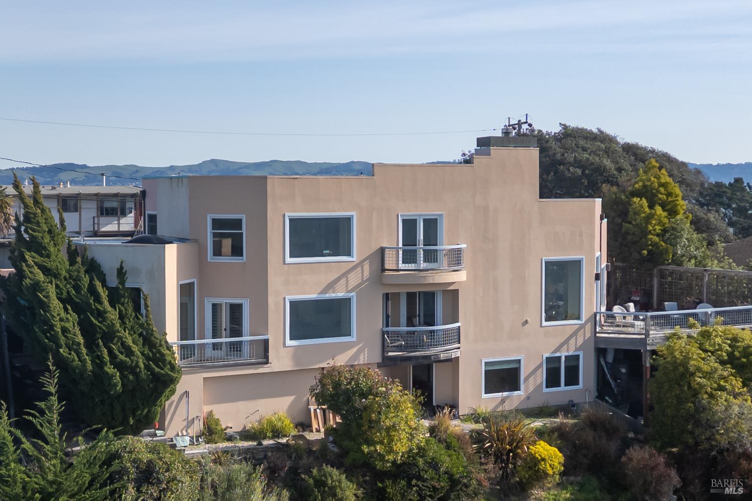 245 Water Street Richmond, CA 94801 - Photo 45 of 45 a large building with a lot of windows