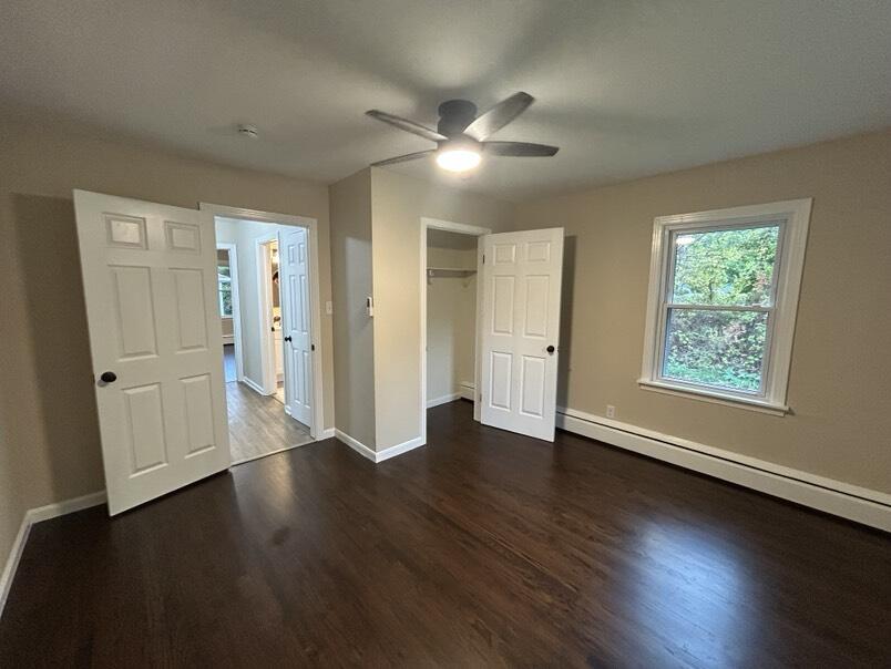 1359 State Street Hobart, IN 46342 - Photo 7 of 14 an empty room with wooden floor and windows