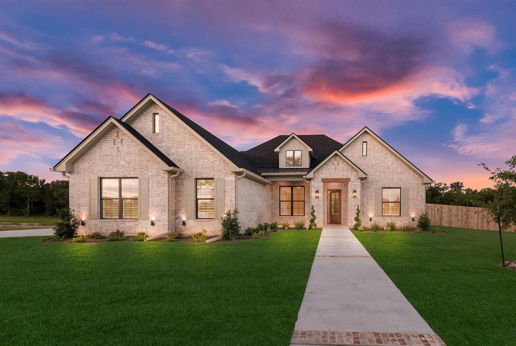 8005 Bee Cave Road China Spring, TX 76633 - Photo 1 of 40 a front view of house with yard and green space
