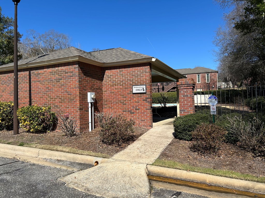 4151 Anglin Road, Unit 22C Columbus, GA 31907 - Photo 23 of 27 a front view of a house with garden
