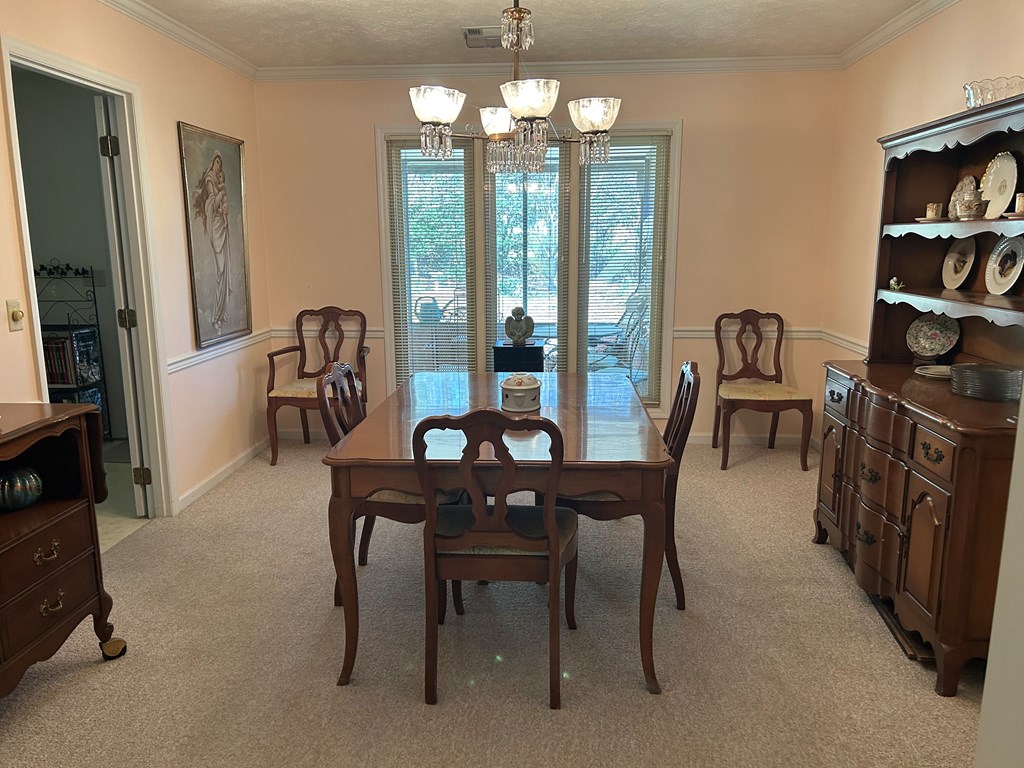 4151 Anglin Road, Unit 22C Columbus, GA 31907 - Photo 5 of 27 a dining room with furniture and window