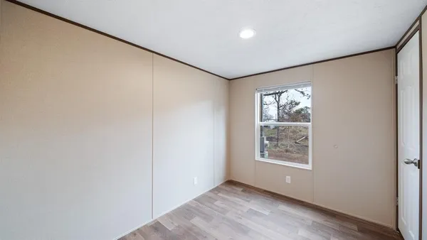 an empty room with windows